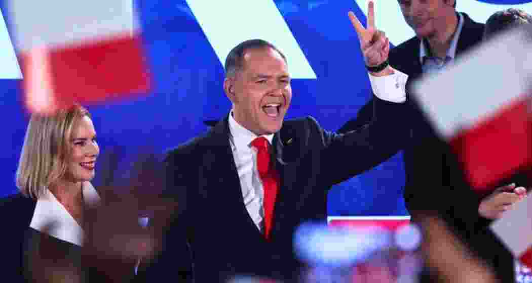 Presidential candidate Karol Nawrocki, a conservative historian, greets supporters at his headquarters after the presidential election runoff in Warsaw, Poland, Sunday, June 1, 2025. Presidential candidate Karol Nawrocki, a conservative historian, greets supporters at his headquarters after the presidential election runoff in Warsaw, Poland, Sunday, June 1, 2025.