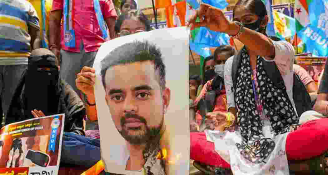 NSUI members burn a poster of JD(S) MP Prajwal Revanna during a protest against his involvement in the alleged sexual abuse case, in Bengaluru. NSUI members burn a poster of JD(S) MP Prajwal Revanna during a protest against his involvement in the alleged sexual abuse case, in Bengaluru.
