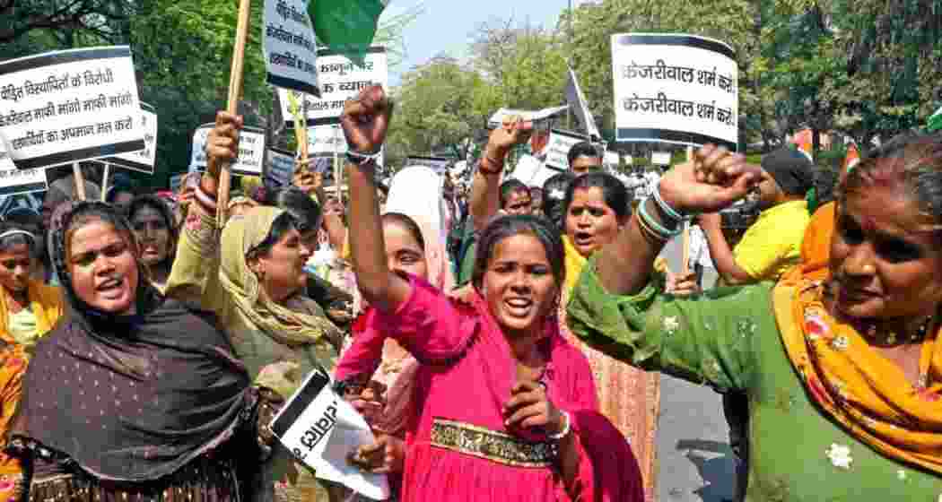 Hindu refugees from Pakistan stage protest outside Delhi CM Arvind Kejriwal's residence over his remarks on CAA, in New Delhi on Thursday. Hindu refugees from Pakistan stage protest outside Delhi CM Arvind Kejriwal's residence over his remarks on CAA, in New Delhi on Thursday.