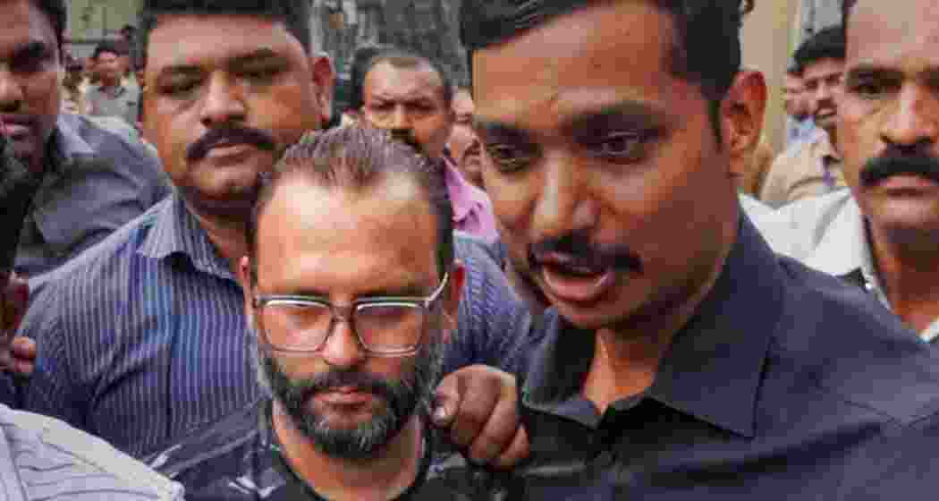 Accused minor's father Vishal Agarwal brought to the police after his arrest (PC: PTI) Accused minor's father Vishal Agarwal brought to the police after his arrest (PC: PTI)