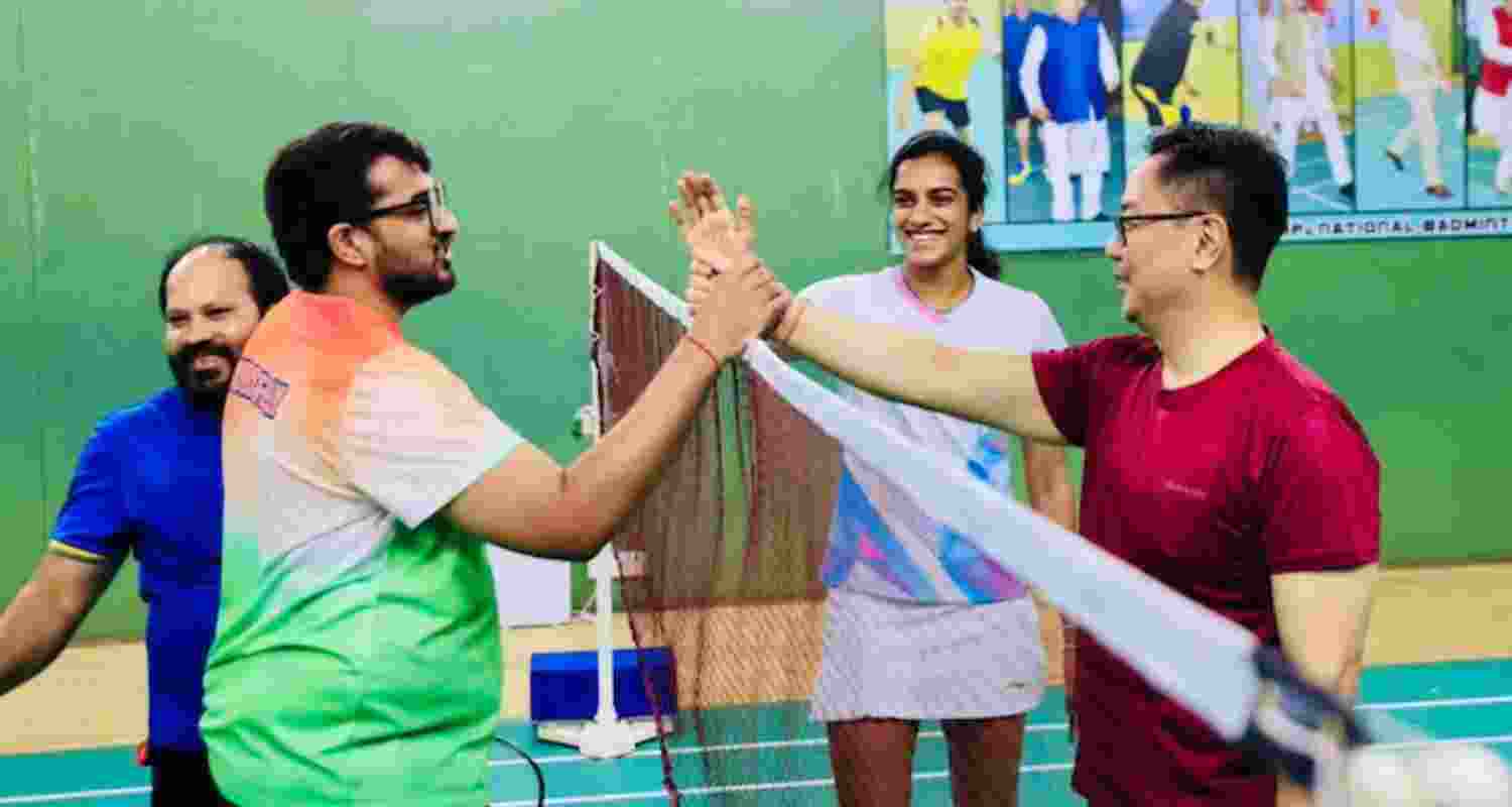 PV Sindhu, Venkata Datta and Kiren Rijiju play badminton in Delhi. PV Sindhu, Venkata Datta and Kiren Rijiju play badminton in Delhi.