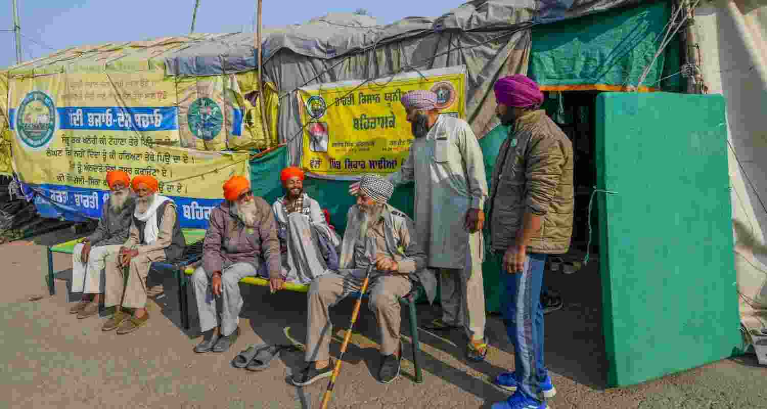 Patiala: Farmers take rest near their tractor-trolley tents a day after their Dilli Chalo march was suspended at Shambu border, in Patiala, Punjab, Monday, Patiala: Farmers take rest near their tractor-trolley tents a day after their Dilli Chalo march was suspended at Shambu border, in Patiala, Punjab, Monday,