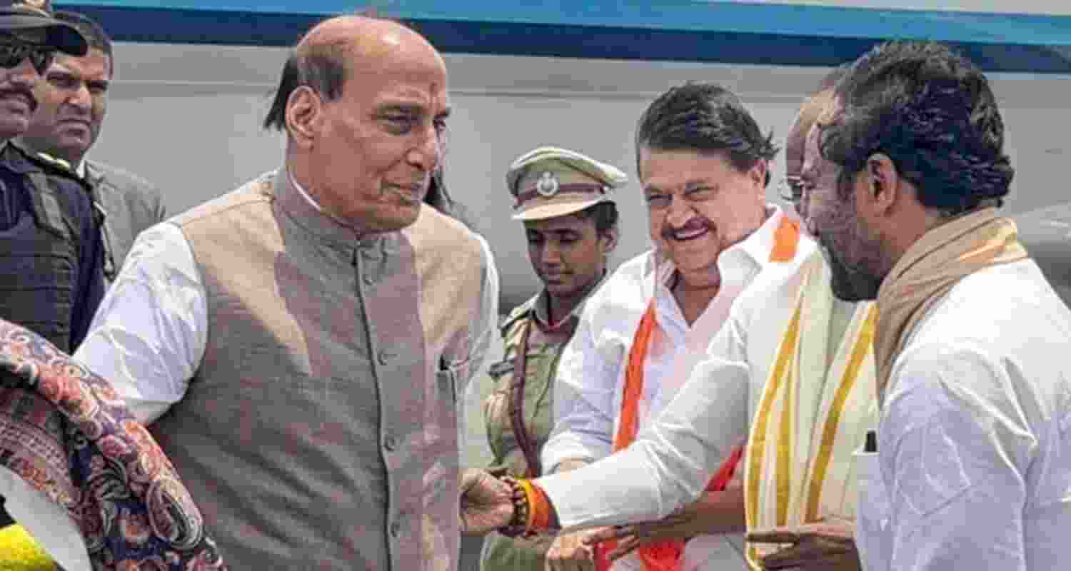 Union Defence Rajnath Singh being received by Union Minister G Kishan Reddy, Telangana BJP President N Ramchander Rao and others upon his arrival at the airport, in Hyderabad. Union Defence Rajnath Singh being received by Union Minister G Kishan Reddy, Telangana BJP President N Ramchander Rao and others upon his arrival at the airport, in Hyderabad.