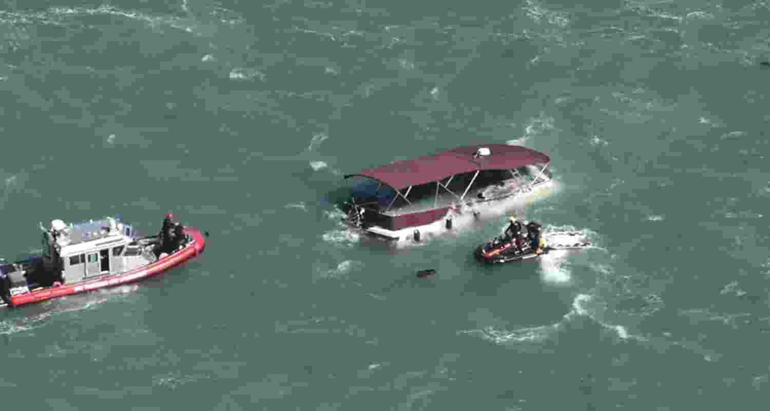Rescue teams respond to a boat accident at sea. Rescue teams respond to a boat accident at sea.