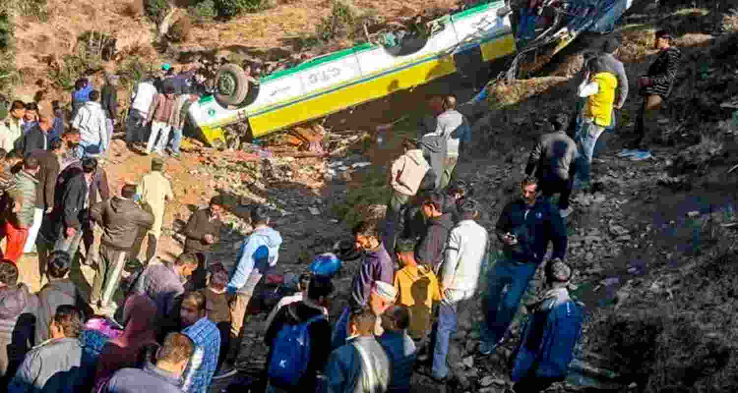Residents and administration officials carry out rescue operations after a private bus plunged into a deep gorge near Haripurdhar in Sirmaur district. Residents and administration officials carry out rescue operations after a private bus plunged into a deep gorge near Haripurdhar in Sirmaur district.
