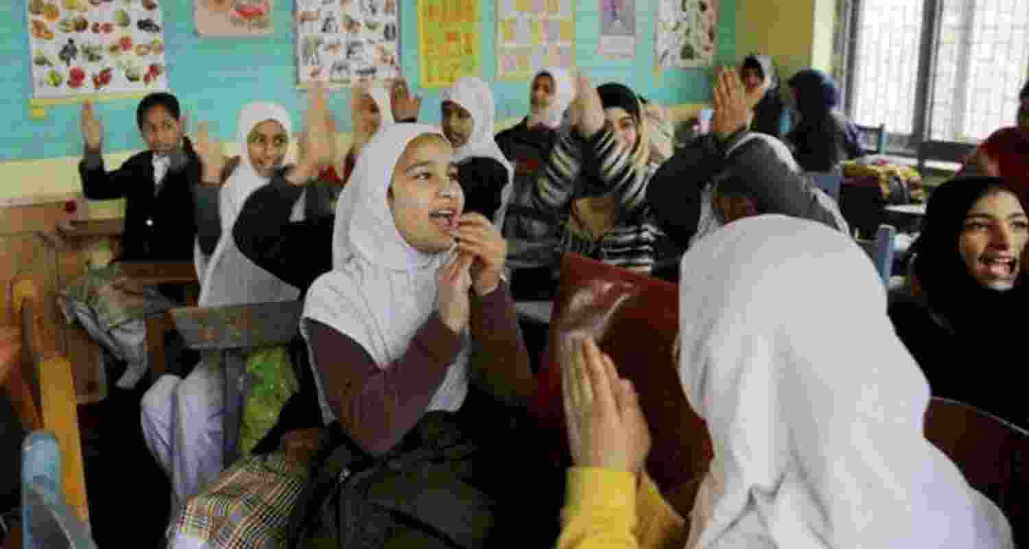 Female school children playing wearing Hijab in a school in Jammu Kashmir Female school children playing wearing Hijab in a school in Jammu Kashmir