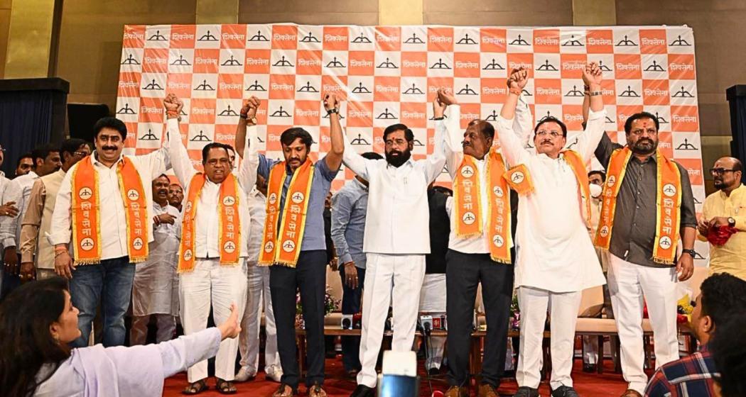 Maharashtra Deputy Chief Minister Eknath Shinde addresses a gathering alongside six rebel Shiv Sena (UBT) Lok Sabha MPs after they joined the Shiv Sena faction led by him, at Yashwantrao Chavan Pratishthan in Mumbai on Monday. Maharashtra Deputy Chief Minister Eknath Shinde addresses a gathering alongside six rebel Shiv Sena (UBT) Lok Sabha MPs after they joined the Shiv Sena faction led by him, at Yashwantrao Chavan Pratishthan in Mumbai on Monday.