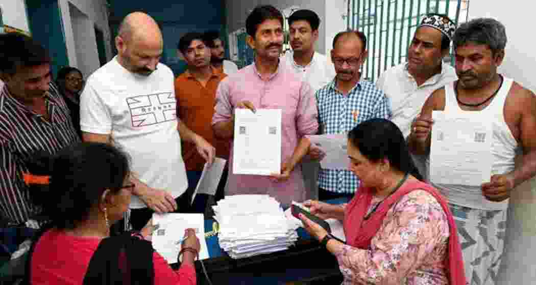 A file photo of the Special Intensive Revision (SIR) process underway in Bihar. A file photo of the Special Intensive Revision (SIR) process underway in Bihar.