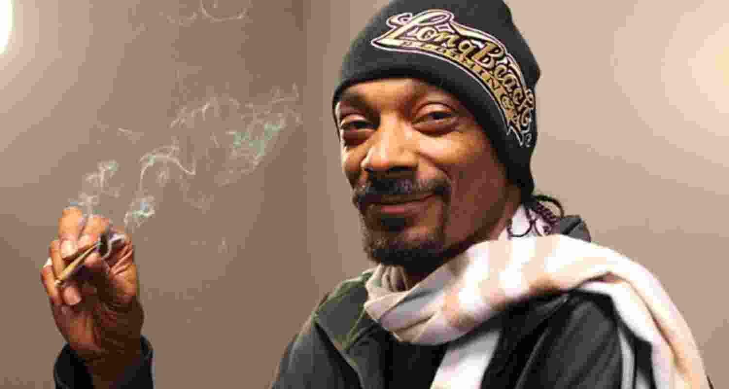 US rapper and musician Snoop Dogg, while smoking marijuana. The artist has quite literally made a name for himself in the rap industry for his cannabis use. US rapper and musician Snoop Dogg, while smoking marijuana. The artist has quite literally made a name for himself in the rap industry for his cannabis use.