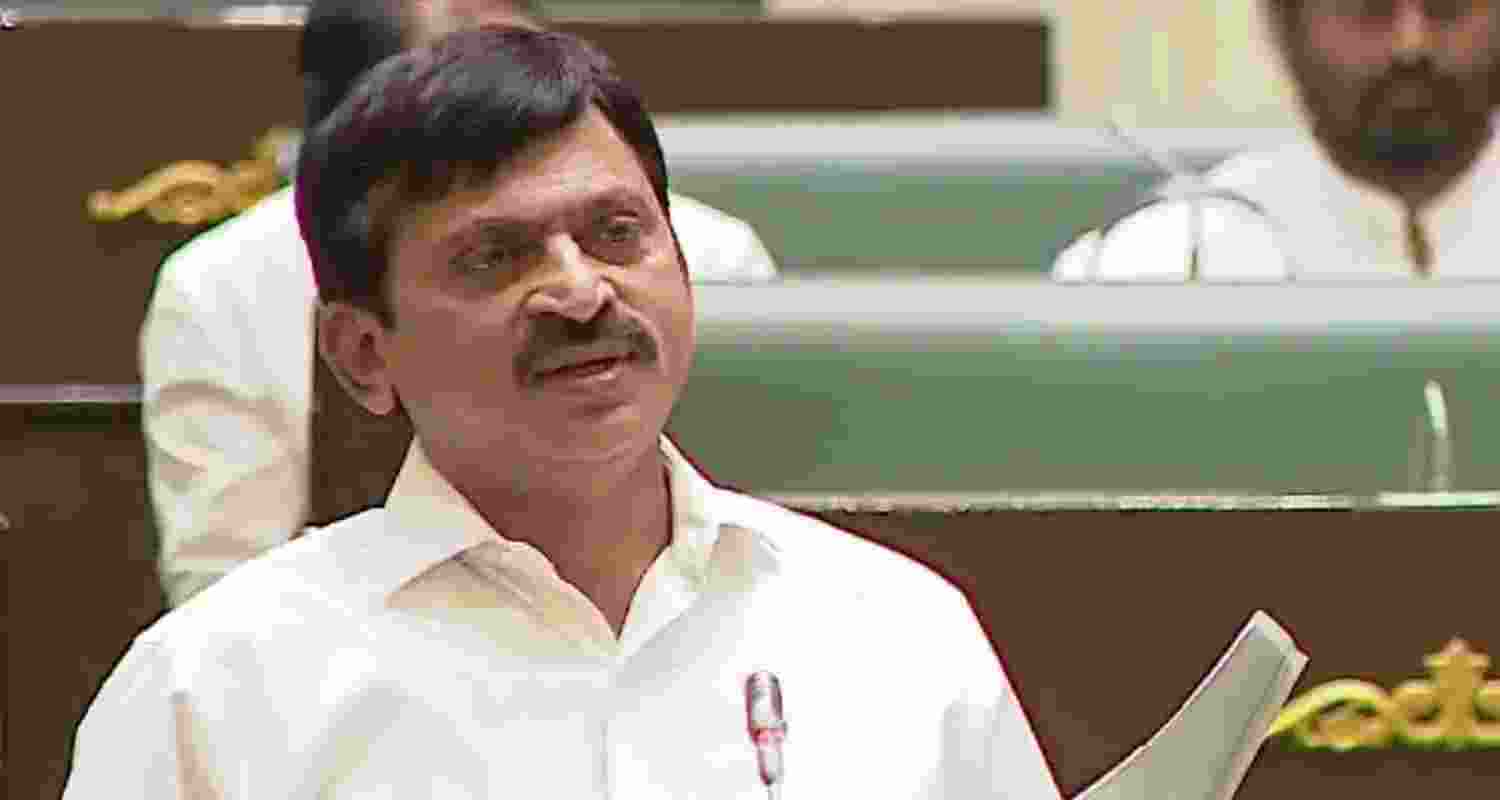 Telangana Revenue Minister P Srinivas Reddy tables the bill in the state assembly. Telangana Revenue Minister P Srinivas Reddy tables the bill in the state assembly.