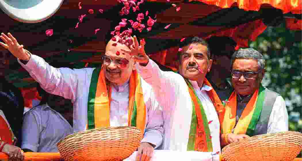 Union Home Minister Amit Shah with West Bengal Chief Minister Suvendu Adhikari. Union Home Minister Amit Shah with West Bengal Chief Minister Suvendu Adhikari.