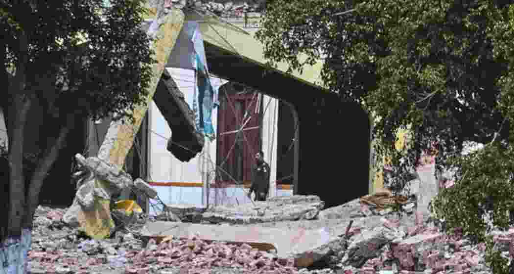 A Pakistani soldier walks through the rubble of the Markaz Taiba, the LeT headquarters in Muridke, one of the terror hubs struck during India’s Operation Sindoor. A Pakistani soldier walks through the rubble of the Markaz Taiba, the LeT headquarters in Muridke, one of the terror hubs struck during India’s Operation Sindoor.