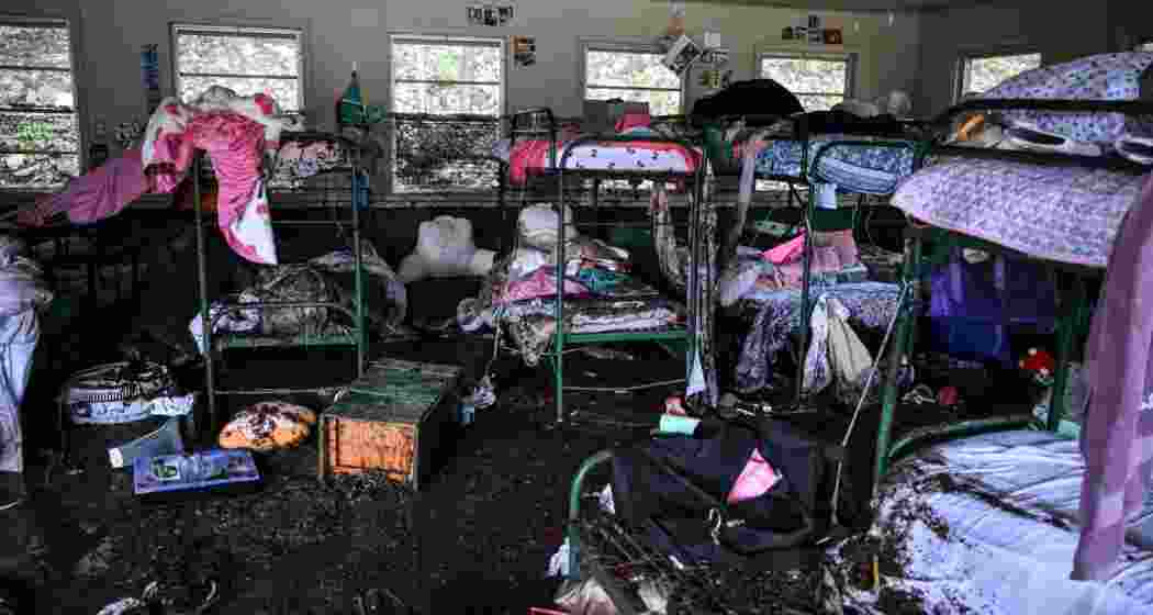 Debris and shattered belongings lie strewn across Camp Mystic in Hunt, Texas, where flash floods on Saturday destroyed cabins and swept through the site, leaving dozens dead and missing. Debris and shattered belongings lie strewn across Camp Mystic in Hunt, Texas, where flash floods on Saturday destroyed cabins and swept through the site, leaving dozens dead and missing.
