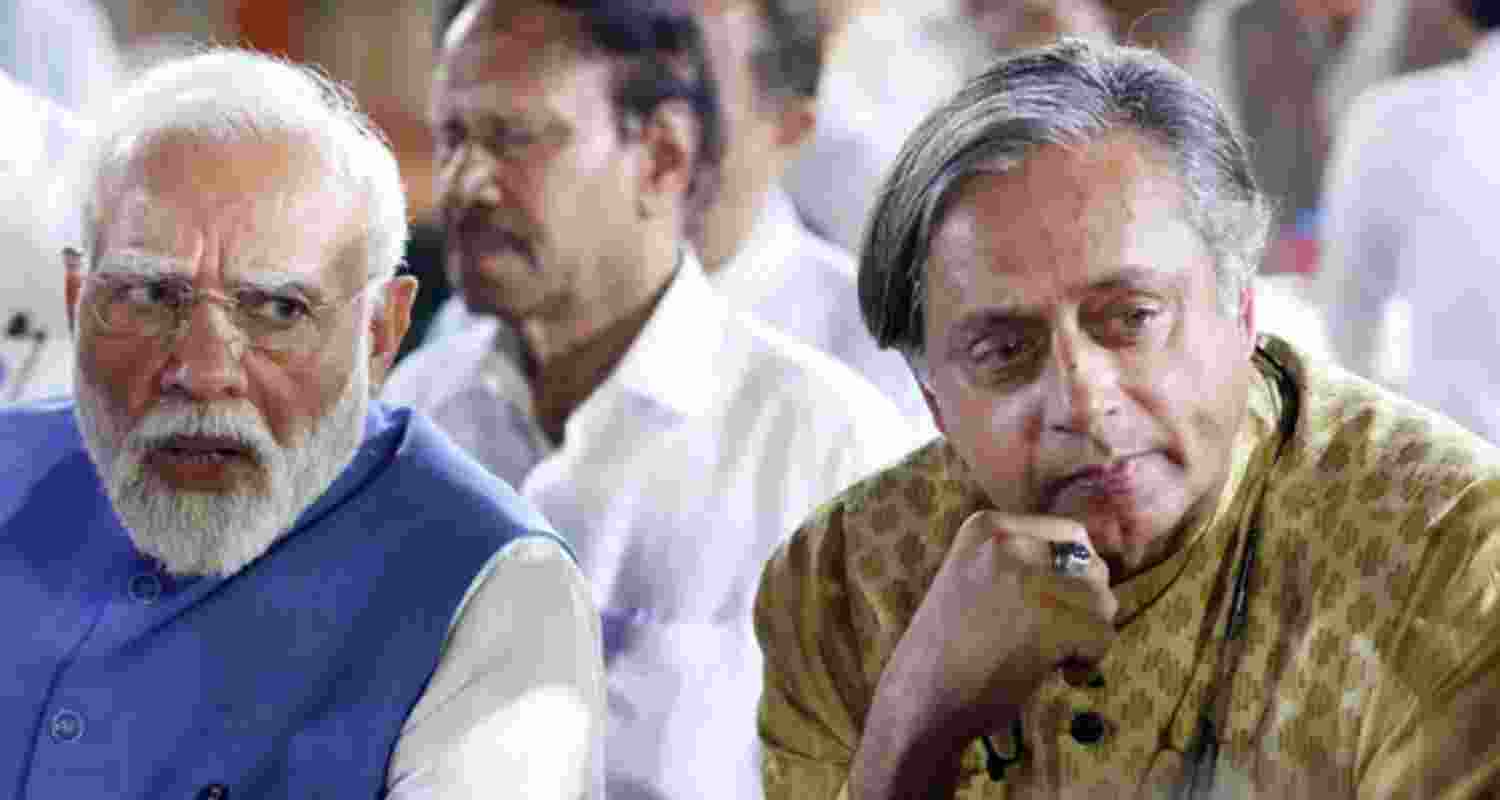 A file photo of Prime Minister Narendra Modi with Congress MP Shashi Tharoor in New Delhi. A file photo of Prime Minister Narendra Modi with Congress MP Shashi Tharoor in New Delhi.