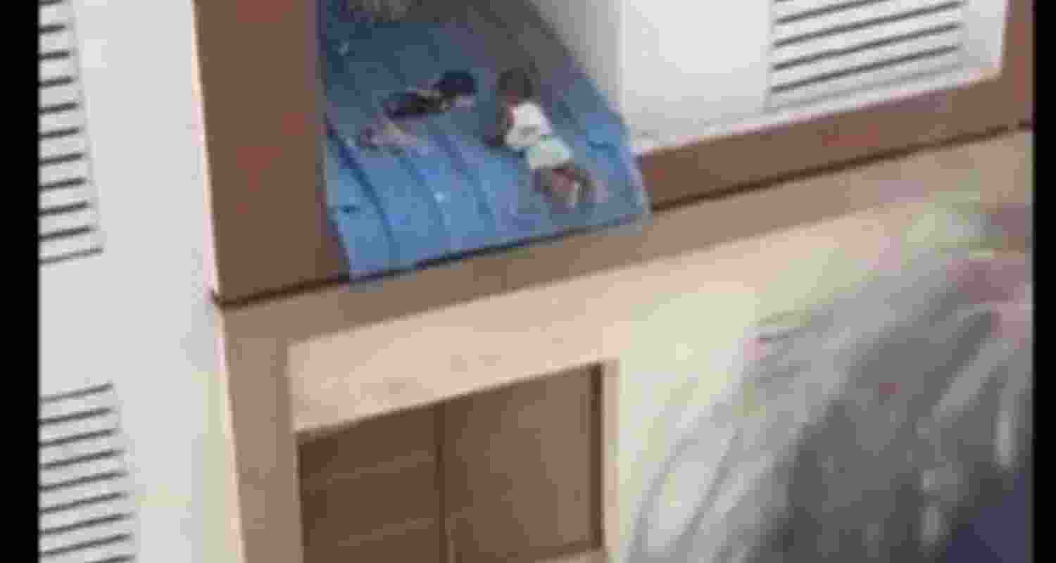 Toddler hanging from window. Toddler hanging from window.