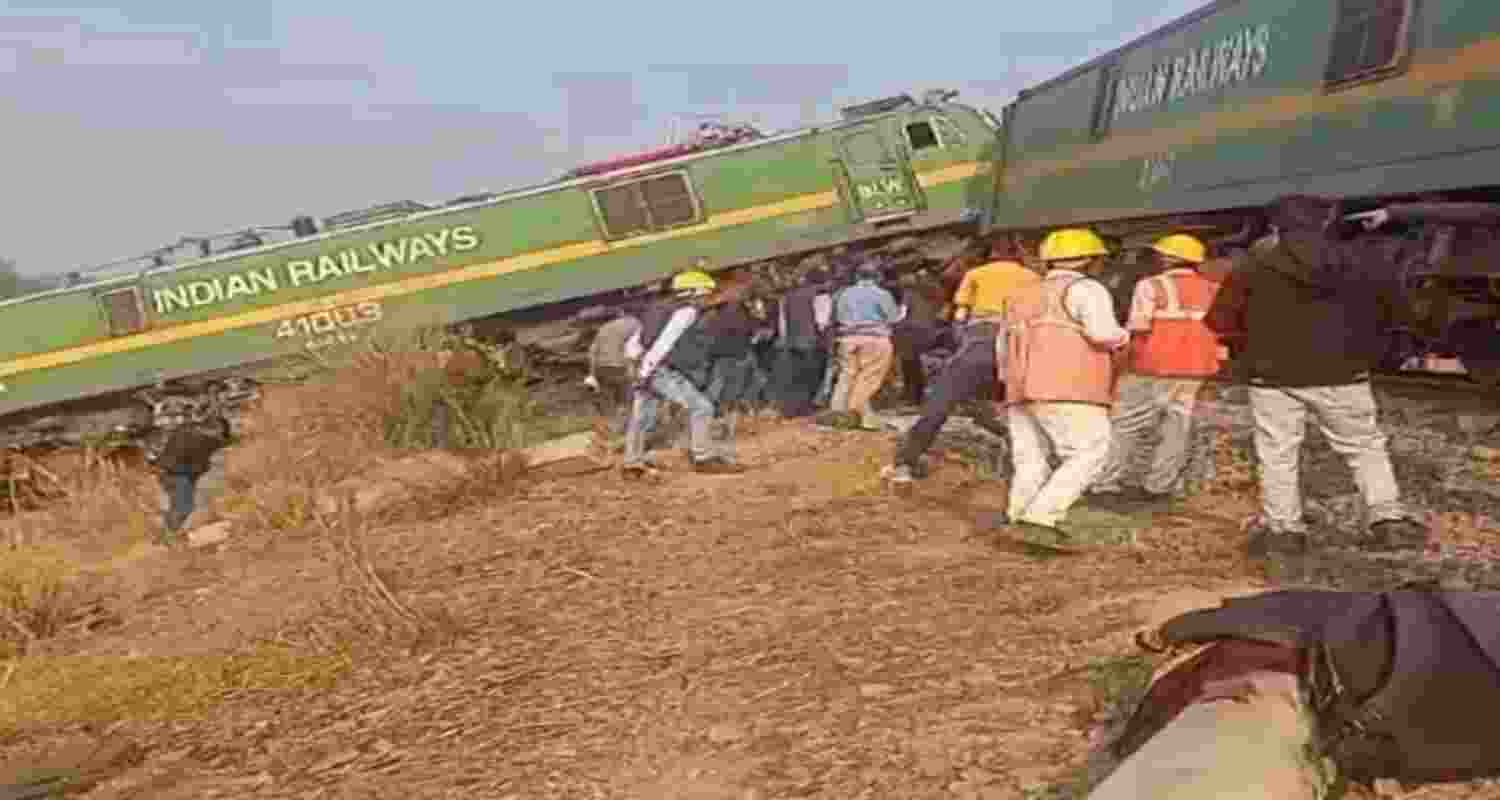 Railway officials at the site after two goods trains collided, near Pambhipur, in Fatehpur district, Uttar Pradesh, Tuesday, Railway officials at the site after two goods trains collided, near Pambhipur, in Fatehpur district, Uttar Pradesh, Tuesday,