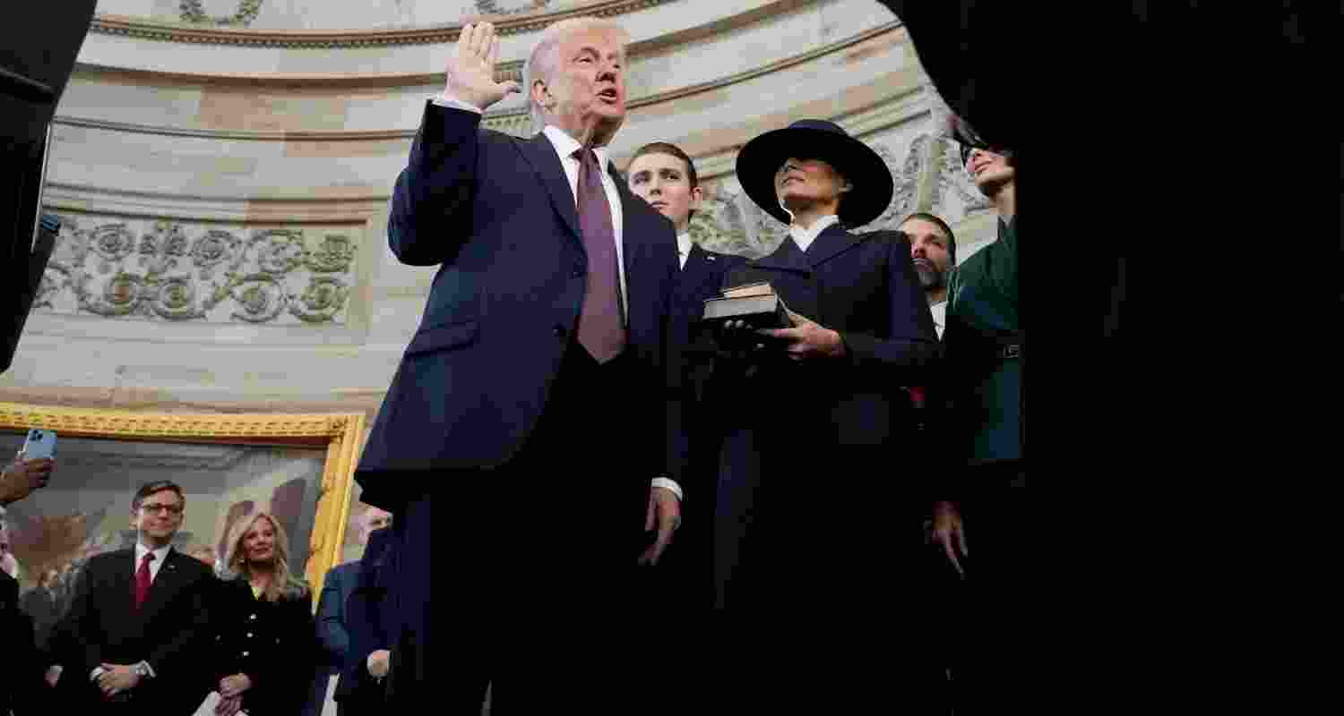 Donald Trump takes oath as US President for the second time. IMage via PTI/AP. Donald Trump takes oath as US President for the second time. IMage via PTI/AP.