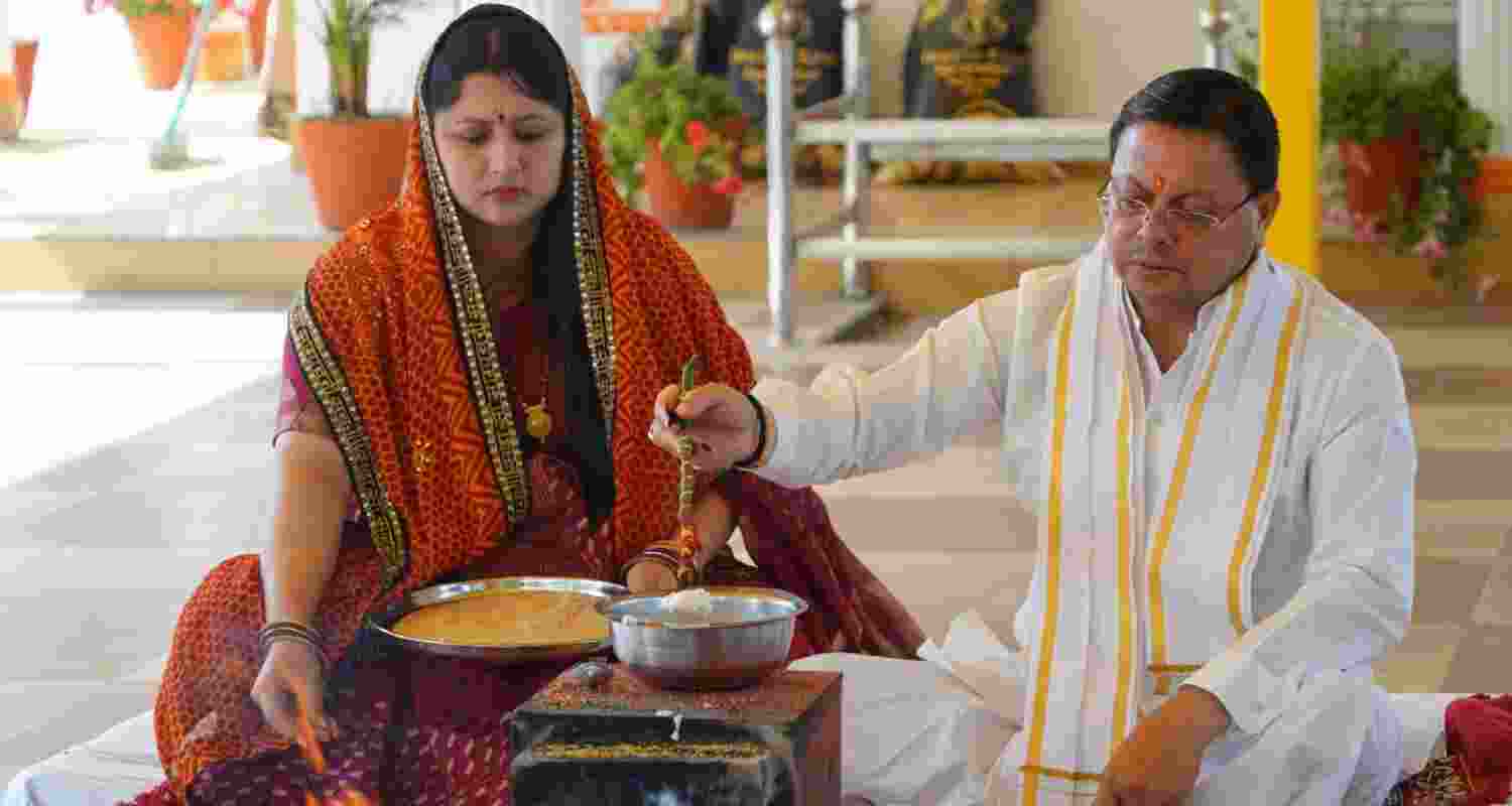 CM Dhami and his Wife offers Navratri Prayers. Image X. CM Dhami and his Wife offers Navratri Prayers. Image X.