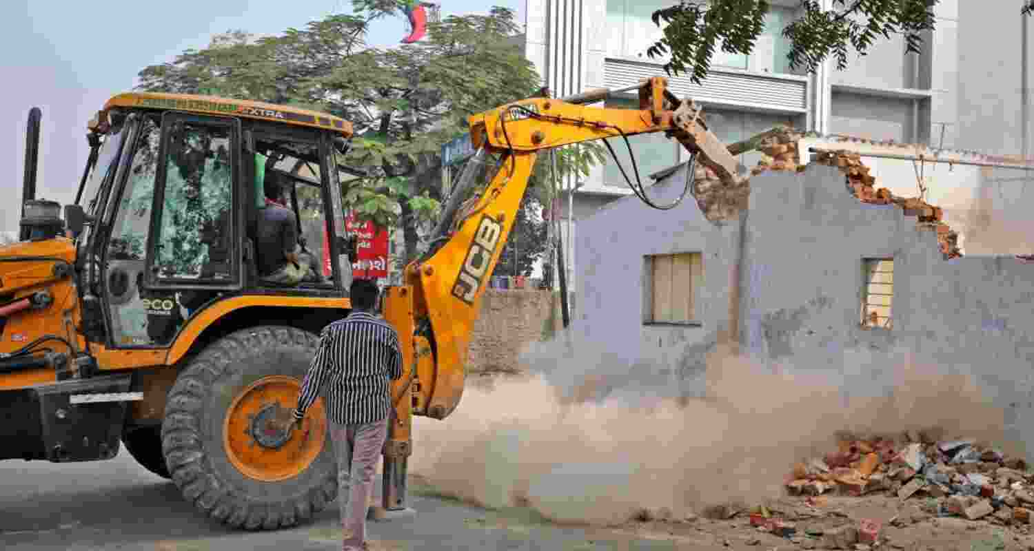Authorities demolish homes of Ahmedabad riot suspects. Authorities demolish homes of Ahmedabad riot suspects.