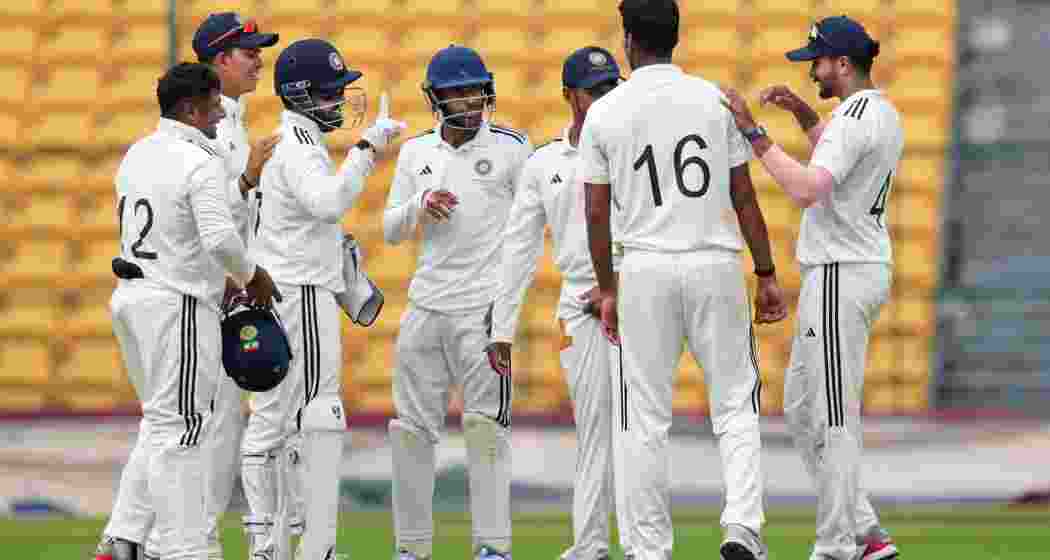 India B team bowler Washington Sunder celebrates with teammates the wicket of India A batter Kuldeep Yadav during the fourth day of the Duleep Trophy 2024 match between India A and India B at Chinnaswamy Stadium, in Bengaluru, Sunday, Sept. 8, 2024. India B team bowler Washington Sunder celebrates with teammates the wicket of India A batter Kuldeep Yadav during the fourth day of the Duleep Trophy 2024 match between India A and India B at Chinnaswamy Stadium, in Bengaluru, Sunday, Sept. 8, 2024.