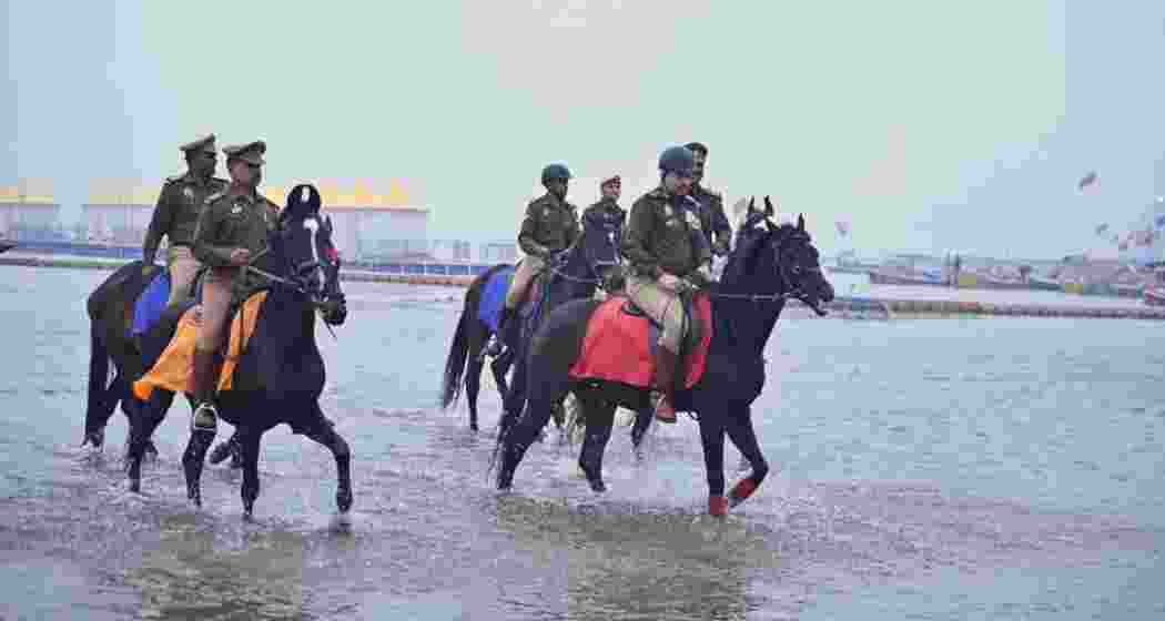 Mounted police patrol checkpoints as Prayagraj prepares for Maha Kumbh. Mounted police patrol checkpoints as Prayagraj prepares for Maha Kumbh.