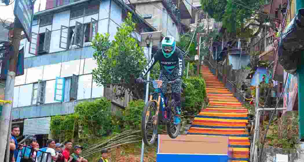 A biker races down Aizawl's steep alleys during the first Red Bull Tlang Ruam, Asia’s only urban downhill event. The city readies for a grander second edition. A biker races down Aizawl's steep alleys during the first Red Bull Tlang Ruam, Asia’s only urban downhill event. The city readies for a grander second edition.