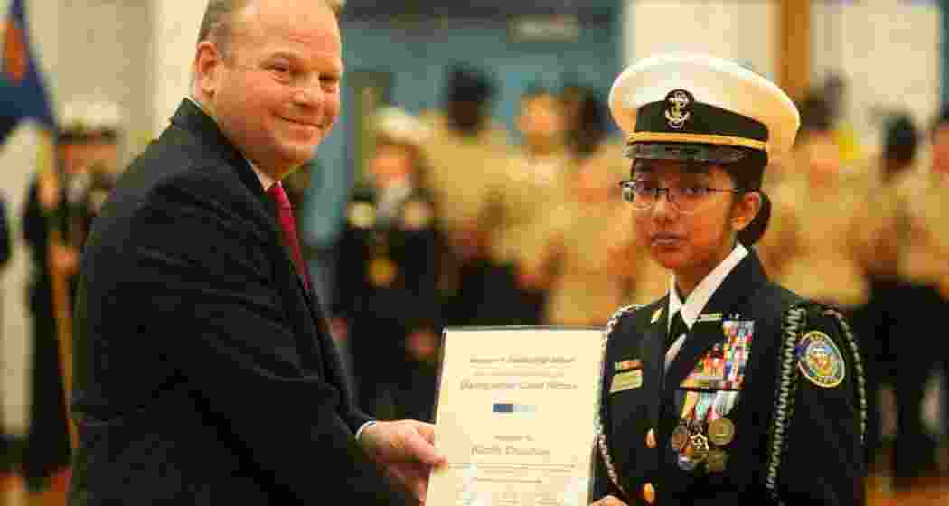 Riddhi Chauhan receives her appointment letter as Battalion Commanding Officer of her school's NJROTC unit, becoming the student leader of nearly 300 US Navy cadets. Riddhi Chauhan receives her appointment letter as Battalion Commanding Officer of her school's NJROTC unit, becoming the student leader of nearly 300 US Navy cadets.