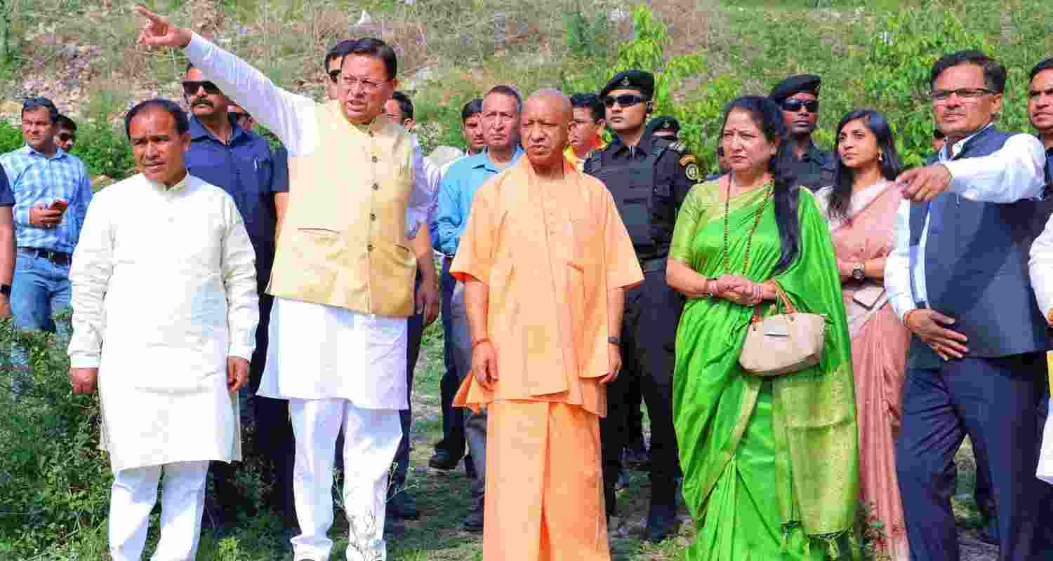Uttar Pradesh Chief Minister Yogi Adityanath with Chief Minister Pushkar Singh Dhami during his visit to the Yamkeshwar region in Uttarakhand Uttar Pradesh Chief Minister Yogi Adityanath with Chief Minister Pushkar Singh Dhami during his visit to the Yamkeshwar region in Uttarakhand