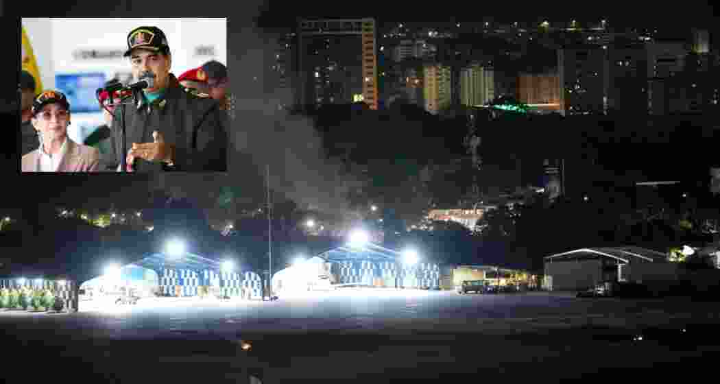 Smoke raises at La Carlota airport after explosions and low-flying aircraft were heard in Caracas, Venezuela, Saturday. Smoke raises at La Carlota airport after explosions and low-flying aircraft were heard in Caracas, Venezuela, Saturday.