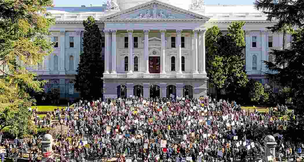 Several hundred demonstrators rally against President Donald Trump outside the California State Capitol on Wednesday, Feb. 5, 2025, in Sacramento, Calif. Several hundred demonstrators rally against President Donald Trump outside the California State Capitol on Wednesday, Feb. 5, 2025, in Sacramento, Calif.