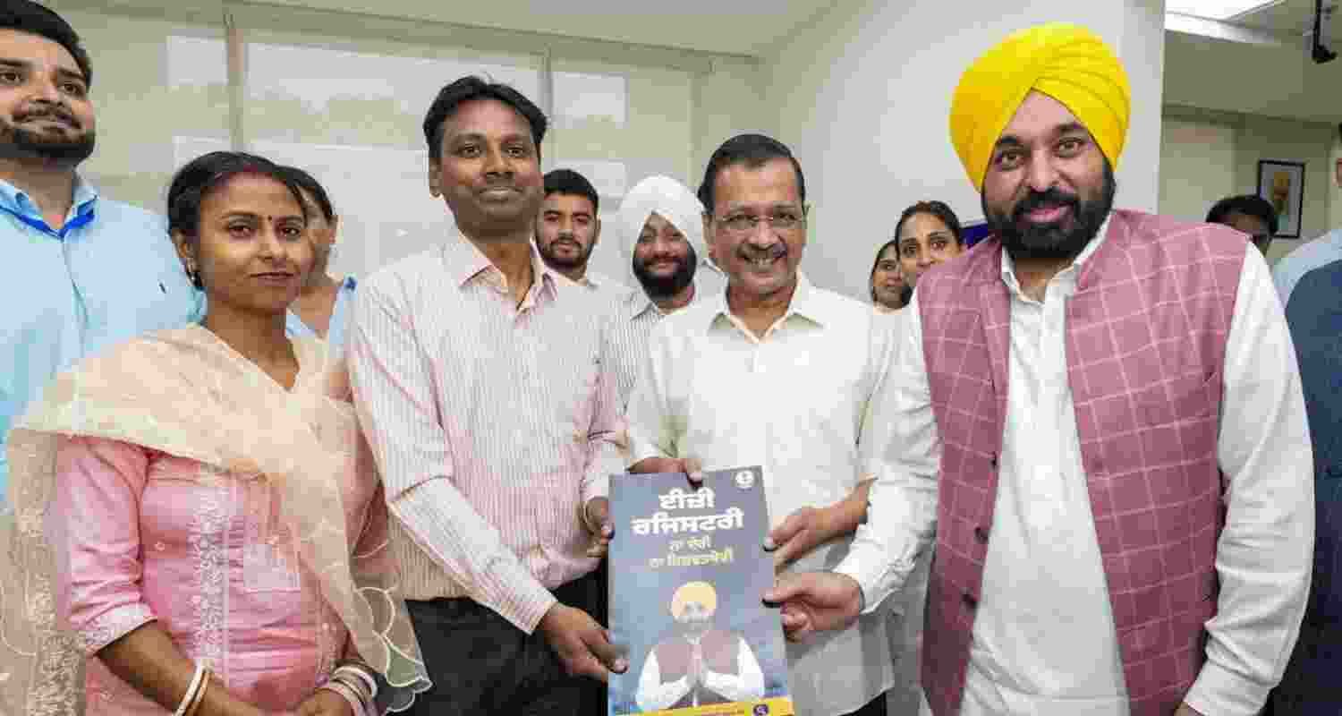 AAP national convener Arvind Kejriwal with Punjab Chief Minister Bhagwant Mann during the launch of a new initiative called 'Easy Registry' in Mohali. AAP national convener Arvind Kejriwal with Punjab Chief Minister Bhagwant Mann during the launch of a new initiative called 'Easy Registry' in Mohali.