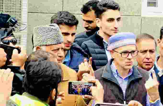 Dr Abdullah’s son, Omar Abdullah, and grandsons  Zahir Abdullah and Zamir Abdullah, cast their ballot at a polling station at Burnhall School in Srinagar's Sonawar neighbourhood. Dr Abdullah’s son, Omar Abdullah, and grandsons  Zahir Abdullah and Zamir Abdullah, cast their ballot at a polling station at Burnhall School in Srinagar's Sonawar neighbourhood.