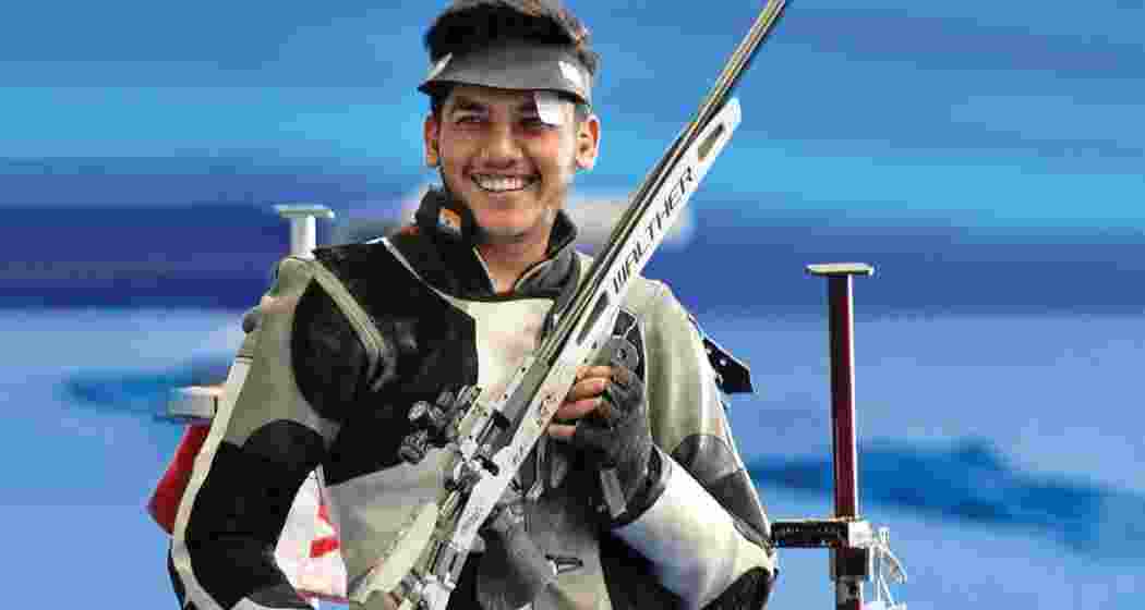 Aishwary Pratap Singh Tomar beams after winning gold. Aishwary Pratap Singh Tomar beams after winning gold.
