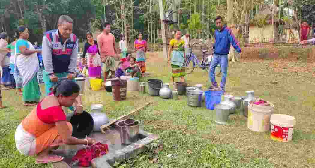 Residents of Ravapara village in Assam's Barpeta line up to collect water from a hand pump, their sole source for daily needs. Residents of Ravapara village in Assam's Barpeta line up to collect water from a hand pump, their sole source for daily needs.