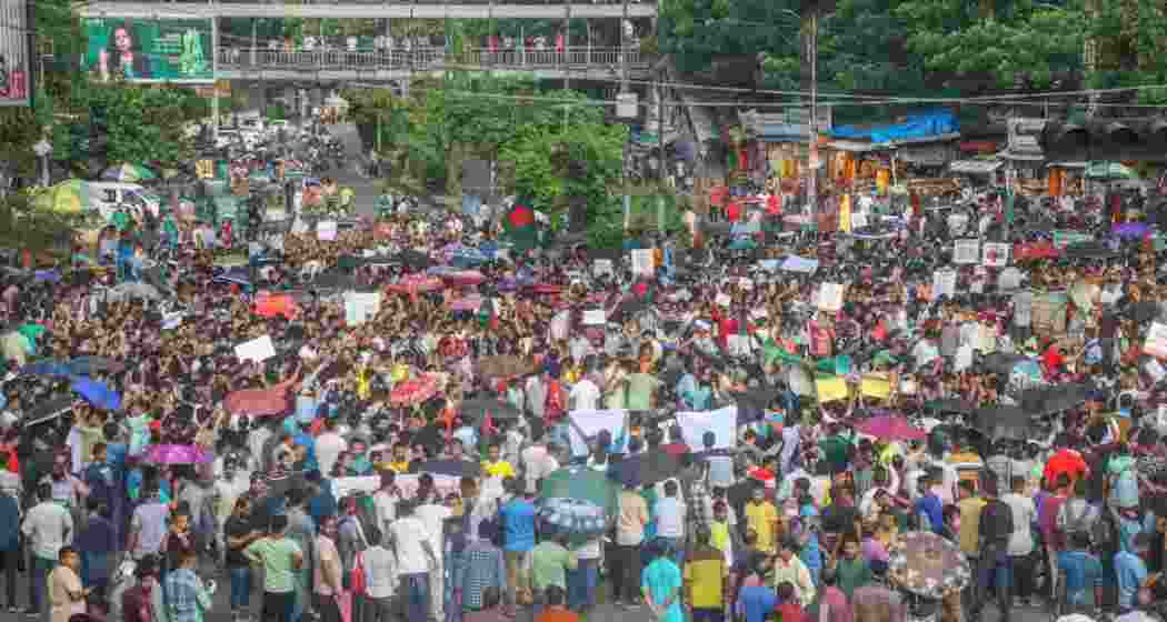 Bangladesh Hindu community members participate in a protest and block the Shahbagh intersection in Dhaka. Bangladesh Hindu community members participate in a protest and block the Shahbagh intersection in Dhaka.