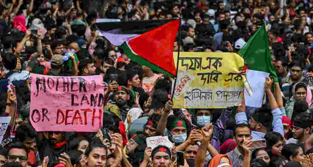 Protesters demonstrate in Dhaka. Protesters demonstrate in Dhaka.
