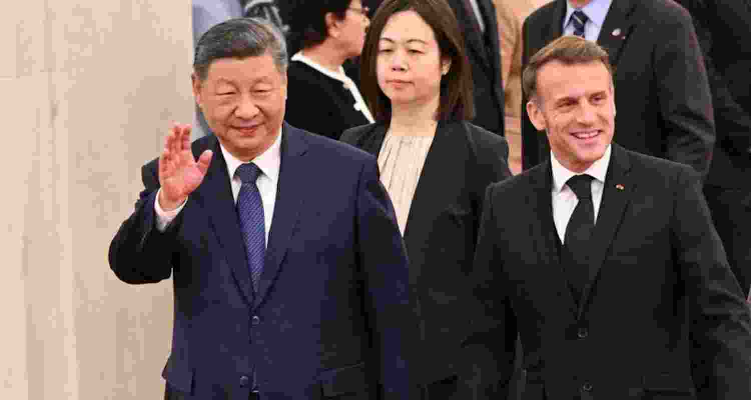 China's President Xi Jinping and France's President Emmanuel Macron attend a welcome ceremony at the Great Hall of the People in Beijing. China's President Xi Jinping and France's President Emmanuel Macron attend a welcome ceremony at the Great Hall of the People in Beijing.