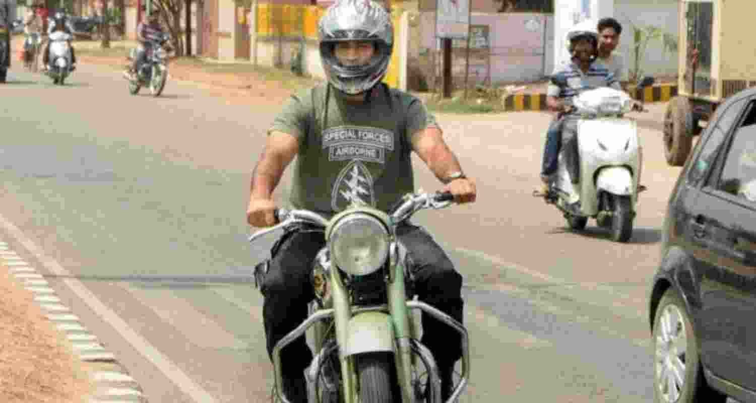 A green two-wheeler adds to his 'special' garage.  A green two-wheeler adds to his 'special' garage.