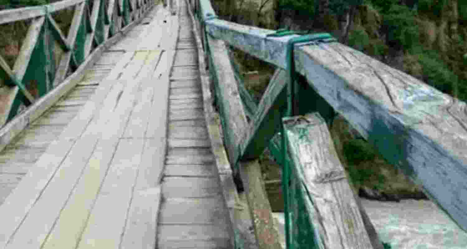 A 60-year-old suspension footbridge in Doda, J&K, declared unsafe, locals demand repair. A 60-year-old suspension footbridge in Doda, J&K, declared unsafe, locals demand repair.