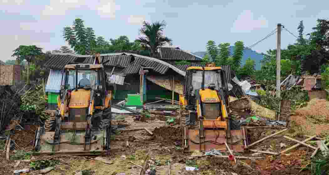 Excavators clear encroached forest land in Goalpara district. Excavators clear encroached forest land in Goalpara district.