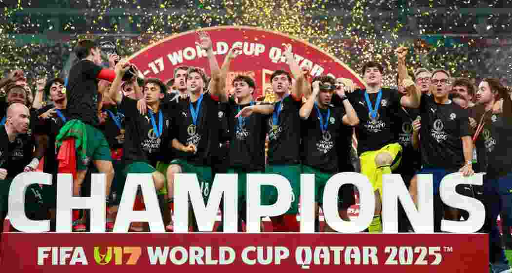 Portugal's players celebrate with the trophy on the podium after the FIFA U17 World Cup final football match against Austria. Portugal's players celebrate with the trophy on the podium after the FIFA U17 World Cup final football match against Austria.