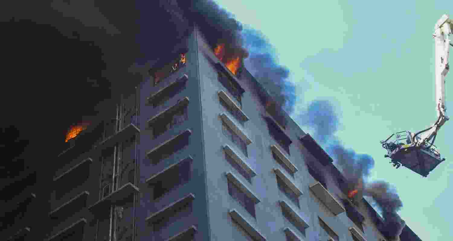 The third, fifth, and top floor of the building are said to have been engulfed in flames, forcing the firefighters to use breathing apparatus to enter the building The third, fifth, and top floor of the building are said to have been engulfed in flames, forcing the firefighters to use breathing apparatus to enter the building