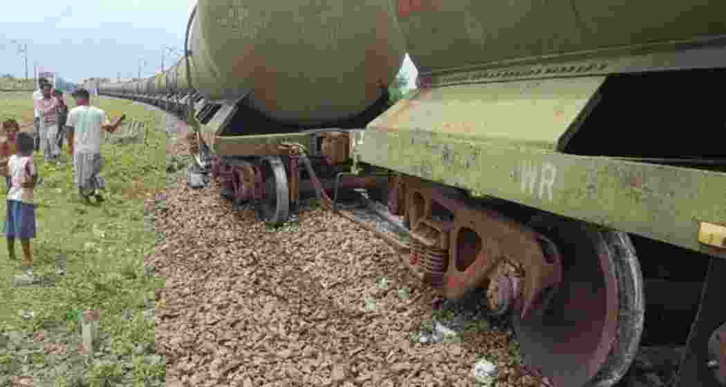 Scenes from the site of the goods train derailment near Kumedpur station in Malda district, where five petrol-laden wagons went off the tracks, disrupting traffic.  Scenes from the site of the goods train derailment near Kumedpur station in Malda district, where five petrol-laden wagons went off the tracks, disrupting traffic.