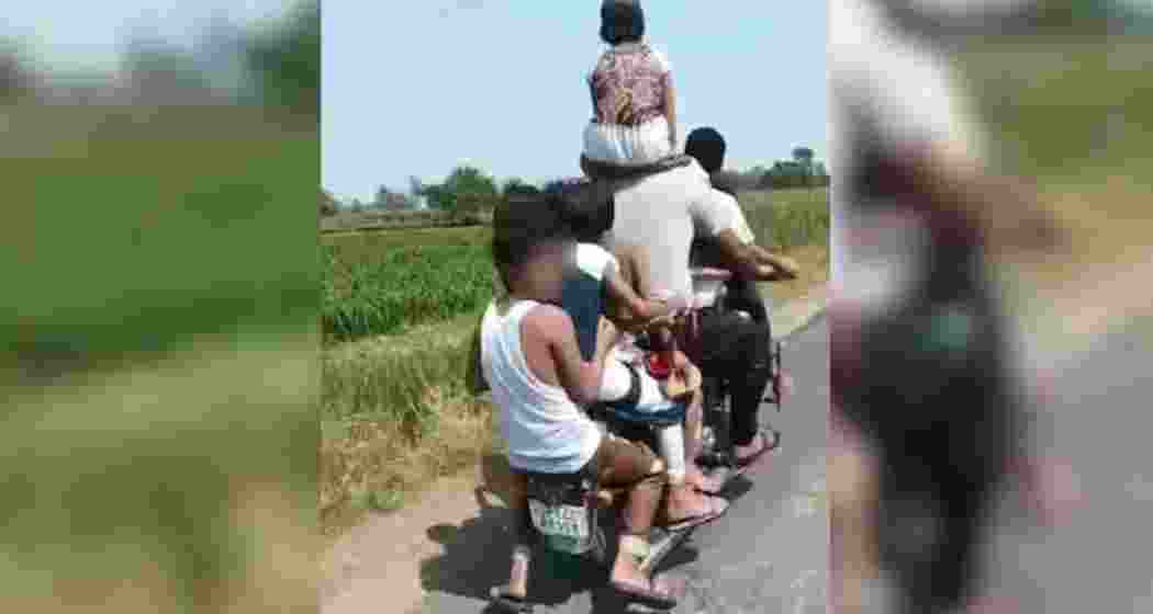 The curious incident in Hapur was captured by a person on a bike right behind the two-wheeler. The curious incident in Hapur was captured by a person on a bike right behind the two-wheeler.