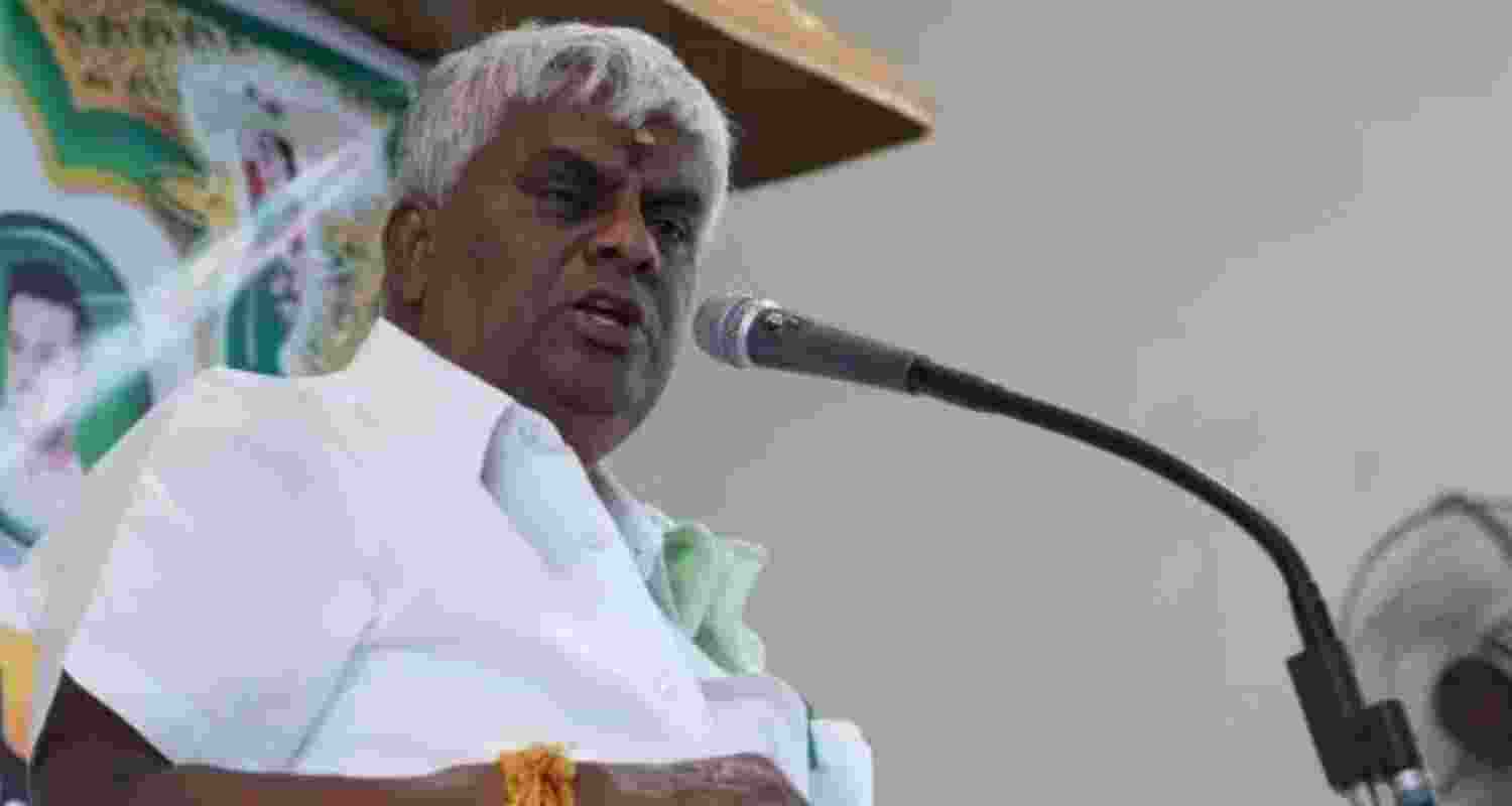 Sathish Babanna in police custody. Sathish Babanna in police custody.