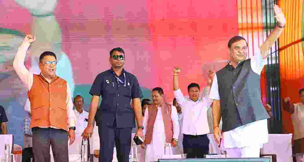 Chief Minister Himanta Biswa Sarma with cabinet minister Ranoj Pegu during an event under the Mukhya Mantri Mahila Udyamita Abhiyan in Dhemaji, Assam on Friday. Chief Minister Himanta Biswa Sarma with cabinet minister Ranoj Pegu during an event under the Mukhya Mantri Mahila Udyamita Abhiyan in Dhemaji, Assam on Friday.