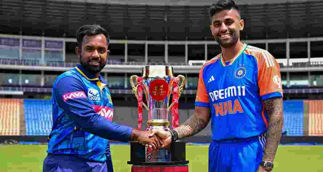 Sri Lankan captain Charith Asalanka with Indian captain Suryakumar Yadav. Sri Lankan captain Charith Asalanka with Indian captain Suryakumar Yadav.