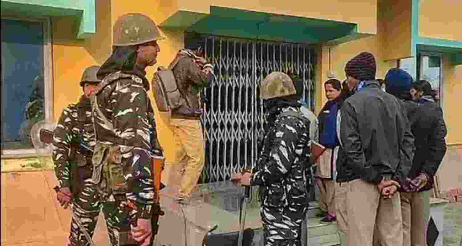 Security personnel during a raid at TMC functionary Shahjahan Sheikh's home at Sandeshkhali in January. Representative Image. Security personnel during a raid at TMC functionary Shahjahan Sheikh's home at Sandeshkhali in January. Representative Image.