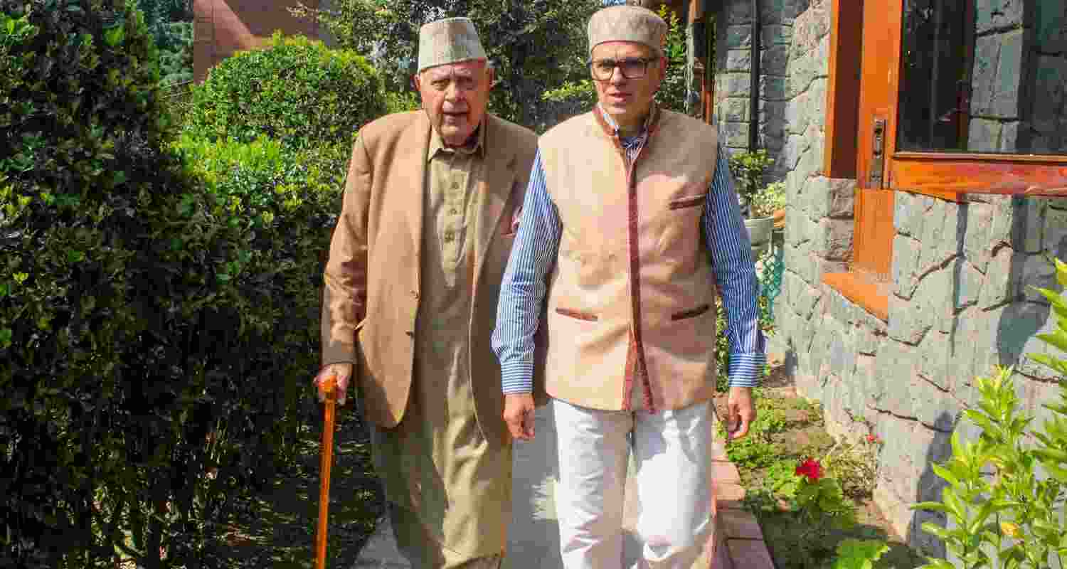 Two generations take a victory walk: JKNC President Farooq Abdullah and Vice President Omar Abdullah at their residence in Srinagar. Two generations take a victory walk: JKNC President Farooq Abdullah and Vice President Omar Abdullah at their residence in Srinagar.
