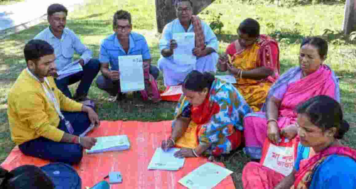 A Booth Level Officer oversees the filling of enumeration forms by voters for the special intensive revision (SIR) - file image. A Booth Level Officer oversees the filling of enumeration forms by voters for the special intensive revision (SIR) - file image.